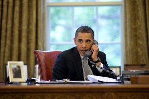 President Barack Obama discusses the response to the BP oil spill, during a phone call with Gulf Coast governors in the Oval Office, May 24, 2010. (Official White House Photo by Pete Souza) This official White House photograph is being made available only for publication by news organizations and/or for personal use printing by the subject(s) of the photograph. The photograph may not be manipulated in any way and may not be used in commercial or political materials, advertisements, emails, products, promotions that in any way suggests approval or endorsement of the President, the First Family, or the White House.