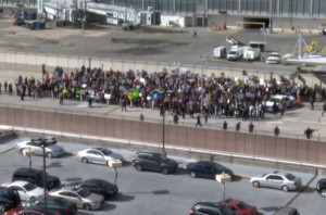 Protesters gather outside of Raleigh International Airport